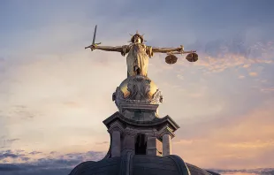 Lady Justice atop the Old Bailey in London. antb/Shutterstock.