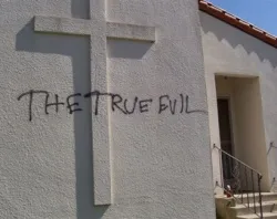 Graffiti on the wall of Siena House at Holy Cross Catholic Church in Santa Cruz, California.?w=200&h=150