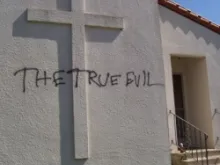 Graffiti on the wall of Siena House at Holy Cross Catholic Church in Santa Cruz, California.