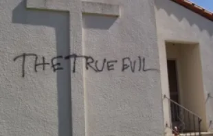 Graffiti on the wall of Siena House at Holy Cross Catholic Church in Santa Cruz, California. 