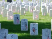 Graves decorated with flags at Arlington National Cemetery on Memorial Day 2008.