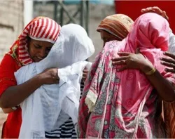 Women greive together after an outbreak of anti-Christian violence in the Punjab provence of Pakistan in August 2011. ?w=200&h=150