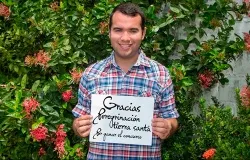 Gustavo Adolfo Franco Picaza of Maracaibo, Venezuela holds a sign with his gratitude for winning the contest. ?w=200&h=150