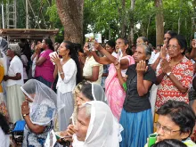 Sri Lankans participate in healing prayers for a day of the sick in August, 2014. 