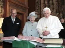 Queen Elizabeth talks with Pope Benedict and exchanges gifts during day one of his state visit to the UK on September 16, 2010 in Edinburgh, Scotland. 