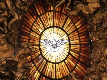 Holy Spirit stained glass in St. Peter's Basilica. 