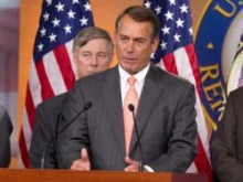  House Speaker John Boehner and Energy and Commerce Chairman Fred Upton (behind) at a press conference on March 10, 2011. 