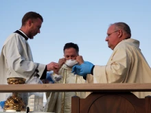 Bishop Peter Baldacchino celebrates Mass on Holy Thursday. 