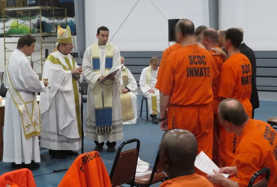 Bishop Robert Guglielmone of Charleston celebrates Mass and Confirmation with inmates at Perry Correctional Institution. ?w=200&h=150