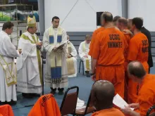 Bishop Robert Guglielmone of Charleston celebrates Mass and Confirmation with inmates at Perry Correctional Institution. 