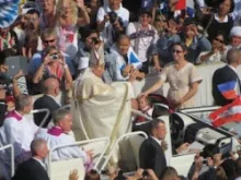 Pope Benedict XVI waves to the crowd after the canonization Mass, Oct. 21, 2012. 