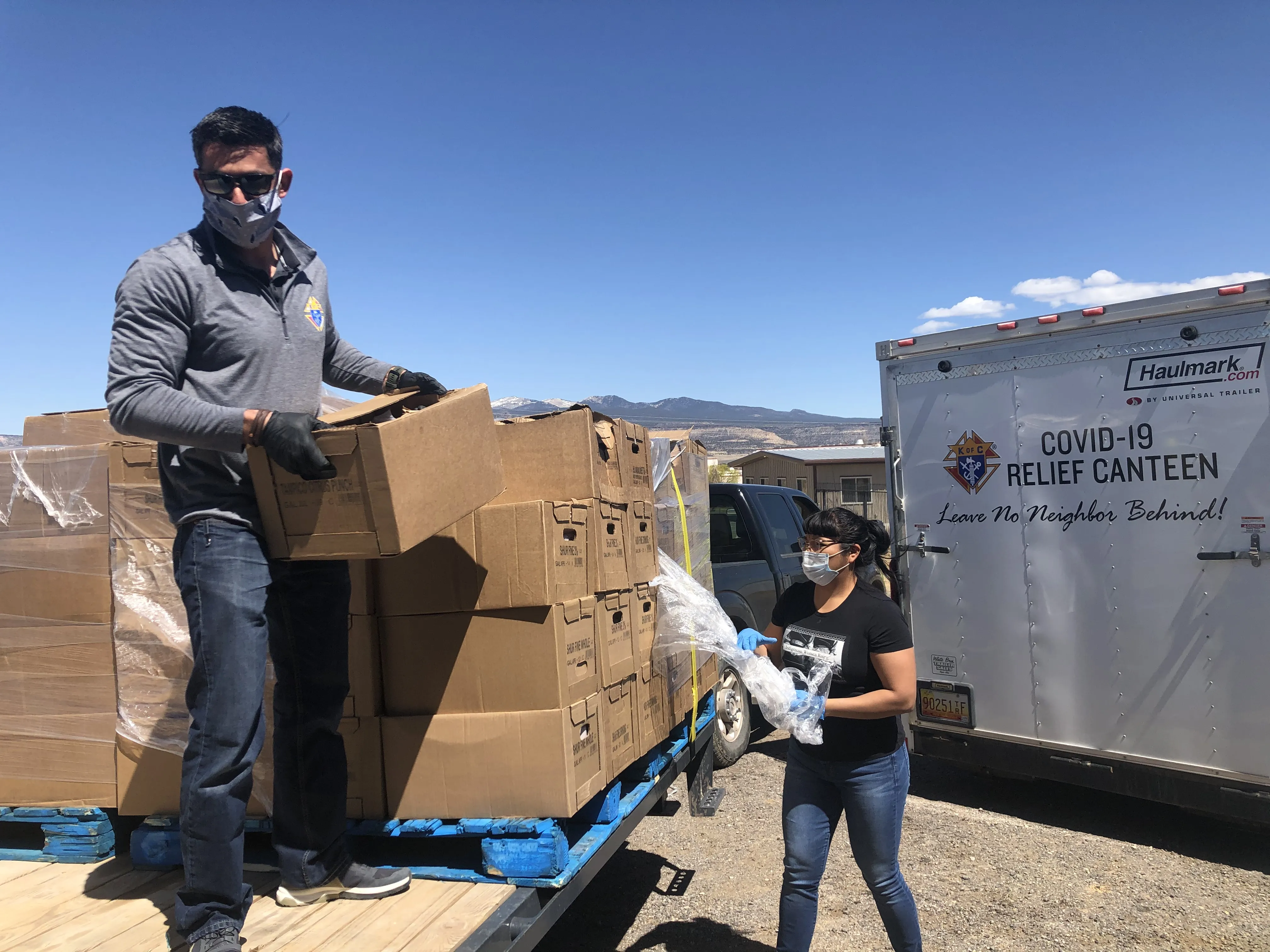 Volunteers deliver food baskets to New Mexico's Acoma pueblo from the "Knights of Columbus Covid-19 Relief Canteen", April 2020. ?w=200&h=150