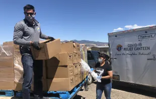 Volunteers deliver food baskets to New Mexico's Acoma pueblo from the "Knights of Columbus Covid-19 Relief Canteen", April 2020.   Patrick Mason.