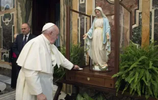Pope Francis blesses a statue of the Immaculate Virgin Mary of the Miraculous Medal Nov. 11, 2020. Credit: Vatican Media. 