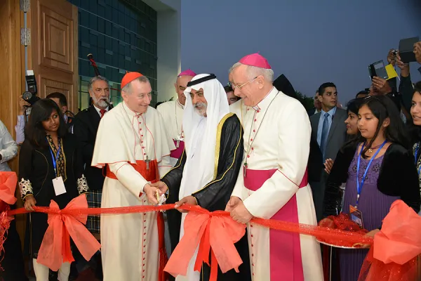 (L-R) Cardinal Parolin, Nahyan bin Mubarak Al Nahyan, and Bishop Hinder assist in the ribbon cutting at the inauguration of St. Paul parish in Mussafah, Abu Dhabi, UAE, June 11, 2015. AVOSA via Flickr.