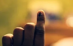 Indian citizens voting in the general elections receive a mark on their finger after casting a ballot. ?w=200&h=150