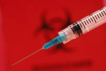 Injection Vaccine Needle Biohazard Credit CDC Debora Cartagena CNA 11 13 14