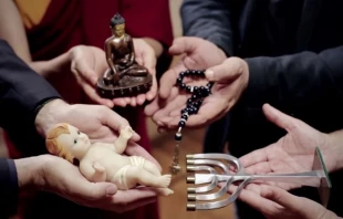 Interfaith leaders hold objects expressing their beliefs in Pope Francis' video message on prayer for interreligious dialogue.   Apostleship of Prayer/Screenshot.