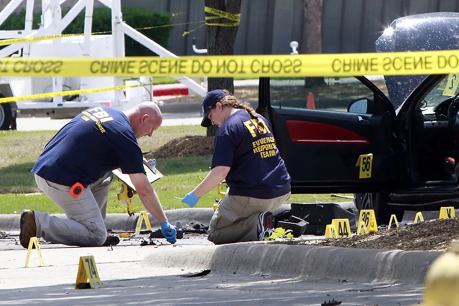 Investigators work on a crime scene outside of Curtis Culwell Center after a shooting on May 4, 2015 in Garland, Texas. ?w=200&h=150