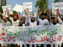 Islamists in Pakistan protest the appointment of an Ahmadi as government adviser in Lahore, Sept. 7, 2018. 