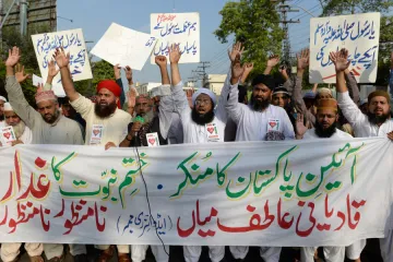 Islamists in Pakistan protest the appointment of an Ahmadi as government adviser in Lahore Sept 7 2018 Credit A M Syed Shutterstock