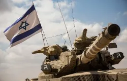 An Israeli tank moves positions near the Israeli-Gaza border the morning of July 18, 2014 near Sderot, Israel. Late last night Israel sent troops into Gaza. ?w=200&h=150