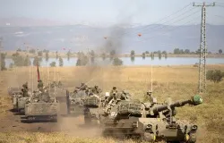 Israeli troops train in Golan Heights, Syria, on June 12, 2013. ?w=200&h=150
