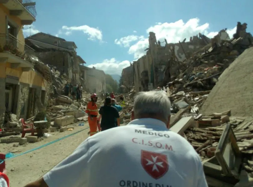 Rescue workers from the Sovereign Military Order of Malta assist in an earthquake affected area, Aug. 24, 2016. ?w=200&h=150