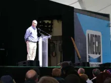 Caption- James Grein speaks at the Silence Stops Now rally in Baltimore, Nov. 13, 2018. 