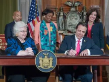 Governor Andrew M. Cuomo signs the Reproductive Health Act during a ceremony at the New York State Capitol in Albany, Jan. 22, 2019. 