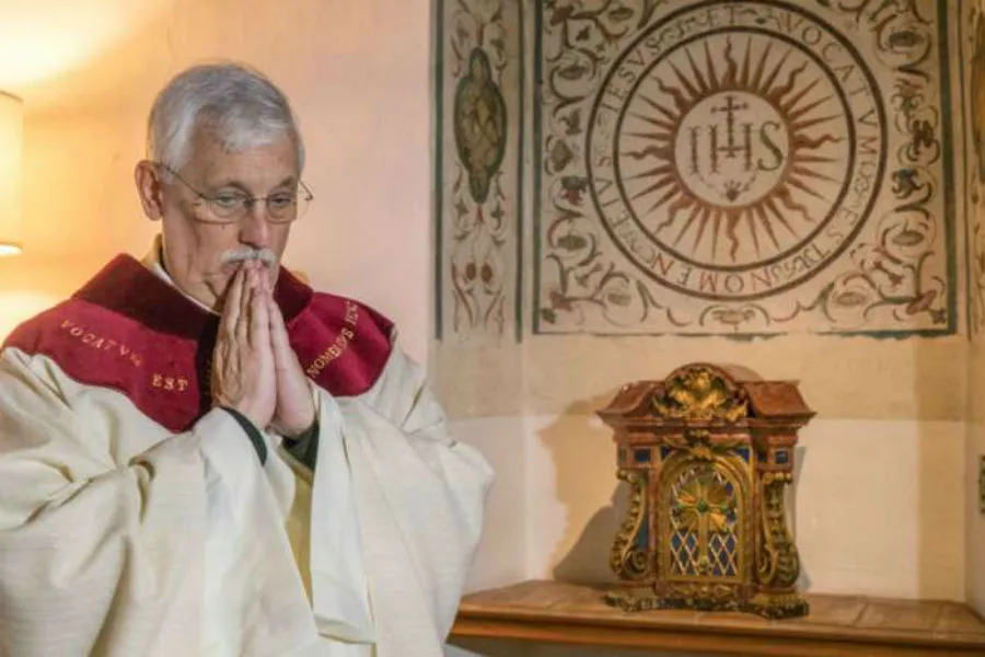 Fr. Arturo Sosa, Superior General of the Society of Jesus, prepares to say Mass at the Gesu in Rome, Oct. 15, 2016. ?w=200&h=150