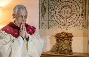 Fr. Arturo Sosa, Superior General of the Society of Jesus, prepares to say Mass at the Gesu in Rome, Oct. 15, 2016.   GC36 via Flickr.