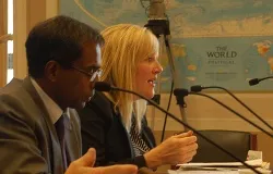 Jill McElya, a human rights lawyer with the Invisible Girl Project, answers a question as Dr. Sabu M. George (R) listens on Sept 9, 2013. ?w=200&h=150