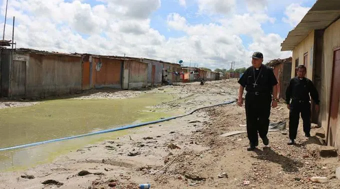 Archbishop Jose Eguren of Piura visits a town affected by flooding. ?w=200&h=150