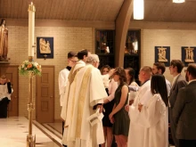 Juliana Pybus is confirmed at Holy Name Catholic Church in Sheridan, Colo., on Easter 2019.