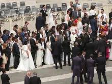 Newly married couples at St. Peter's Square awaiting to be blessed by Pope Francis, May 6, 2015. 