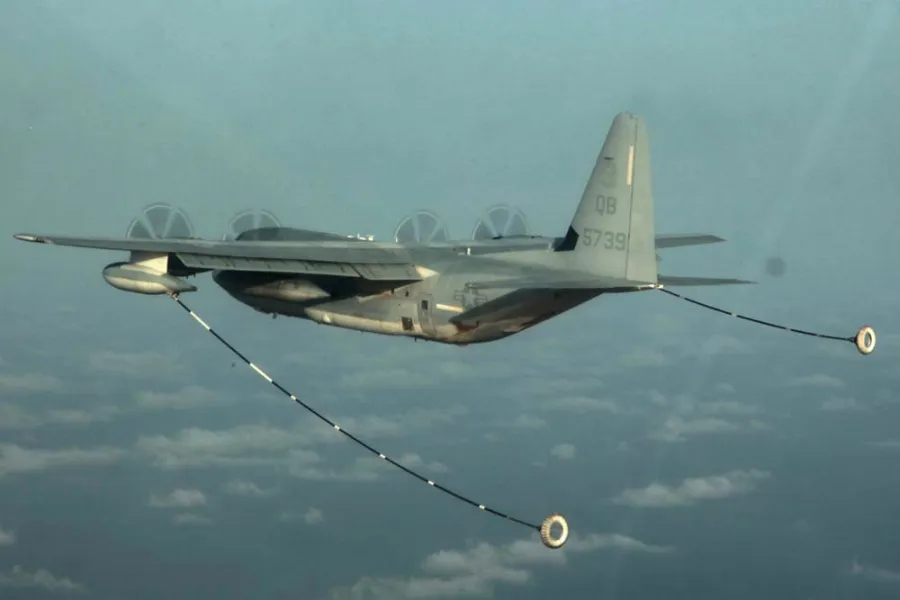A KC-130 Hercules prepares to refuel a CH-53E Super Stallion during training over the Pacific Ocean, March 14, 2013. U.S. Marine Corps photo by Cpl. John Robbart III.?w=200&h=150