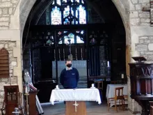 Jarek Kwiatkowski of KT Electronics tests a livestream installation at a church in Wales. Photo courtesy of KT Electronics.