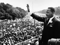 Martin Luther King Jr. addresses a crowd from the steps of the Lincoln Memorial where he delivered his famous I Have a Dream speech during the Aug 28 1963 march on Washington DC.