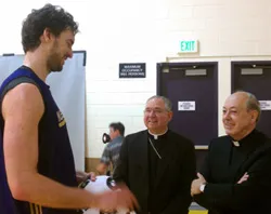 LA Lakers player Pau Gasol talks with Archbishop Jose Gomez and Cardinal Juan Luis Cipriani.?w=200&h=150