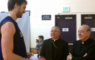 LA Lakers player Pau Gasol talks with Archbishop Jose Gomez and Cardinal Juan Luis Cipriani. 