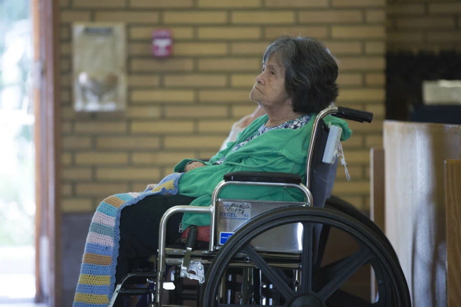 A participant at the LA Mass kicking off a novena for the elderly and terminally ill. Archdiocese of Los Angeles/Dima Otvertchenko.   ?w=200&h=150