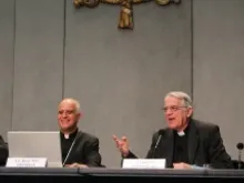 (L-R) Archbishop Rino Fisichella and Father Federico Lombardi speak to the press May 28, 2013 about the upcoming Year of Faith events. 