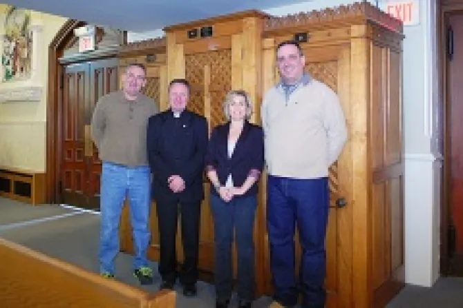 L R Timothy Conlon Fr Janusz Kukulka Lisa Knott and her husband Patrick stand in front of the refurbished confessional Credit Jack Sheedy The Catholic Transcript CNA 5 3 13