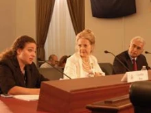Caroline Doss, Michele A. Clark and Jean Maher (L to R) take part in a July 22 hearing for the U.S. Helsinki Commission