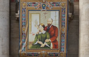 A tapestry of Blessed Louis and Zelie Martin, parents of St. Therese of Lisieux, hanging in St. Peters Square Oct. 16, 2015, in preparation for their canonization on Sunday. Daniel Ibanez/CNA.