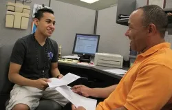  An undocumented immigrant completes the paperwork required by the US Citizenship and Immigration Services to apply for Deferred Action. ?w=200&h=150