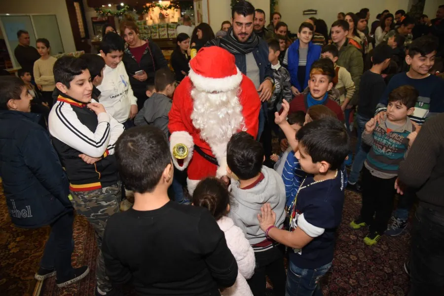 Lebanese Christian children meet St. Nicholas during a 2018 gift drive by St. Rafka Mission of Hope and Mercy. ?w=200&h=150