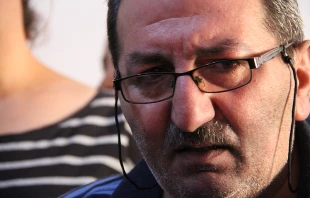 Maan George Hanna, an Iraqi Christian refugee at a church shelter in Jordan. Kim Pozniak/CRS.