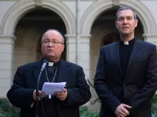 Archbishop Charles Scicluna (L) and Msgr Jordi Bertomeu at a press conference at the Catholic University of Chile on June 13, 2018. 